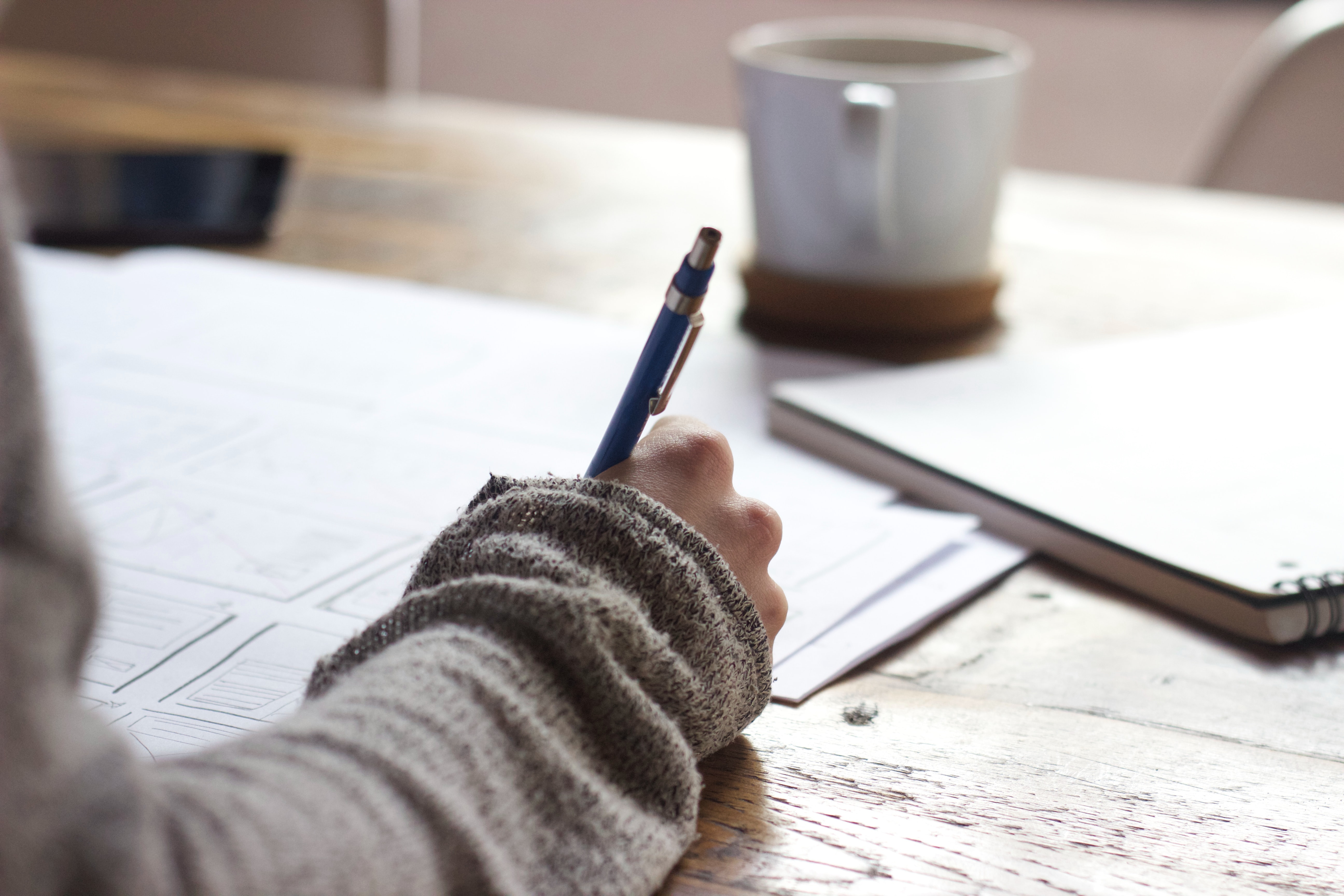 Writing tasks out by hand — sorting work into projects, chores and responsibilities