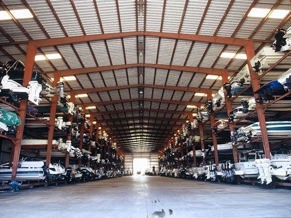 Interior look at a metal building that stores sea craft